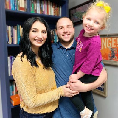 Hannah with husband Michael and their eldest daughter, Emily.