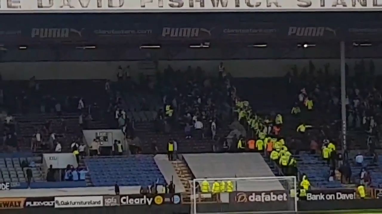 Match abandoned after crowd violence