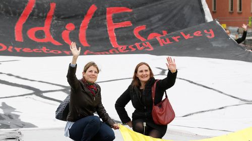 Amnesty International Poland members staged a demonstration calling for the release of Idil Eser. (AAP)