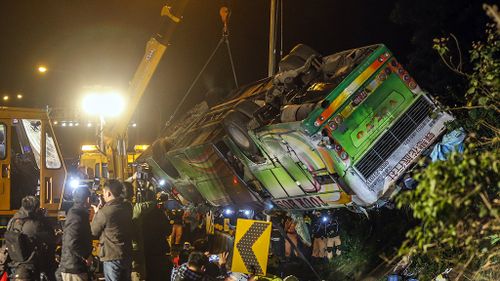 At least 32 dead in Taiwan's worst highway accident in decades