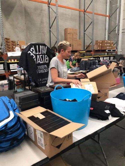 Jen Armstrong sorts out at supplies at the Beauty Bank warehouse.