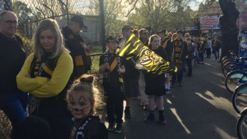 Tiger Army lines up more than 2km to get into the training session. 