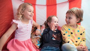 Three kids enjoy the facilities at the Kids' Therapy Club. (The Kids' Therapy Club is a special built facility based at Tamborine Mountain State School. (Claire Elise Photography)