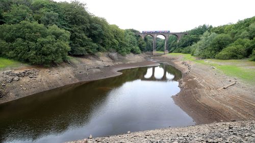 Low water levels in Wayoh Reservoir  near Bolton in north west England as millions of people are facing a hosepipe ban. (Photo: AP).