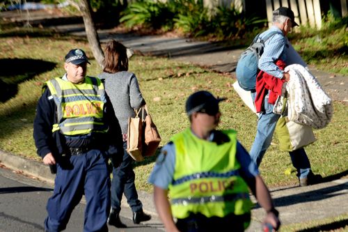 Residents of Hull Street have returned to their homes after police closed it down after the shooting last night. Picture: AAP