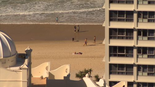 Drones have been seen snooping on beachgoers on the Gold Coast.