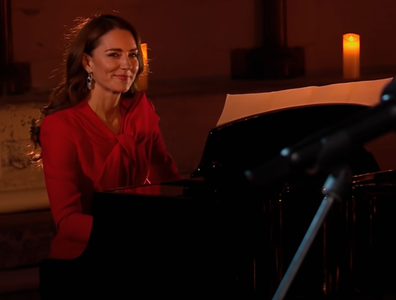 Kate Middleton playing piano at carols concert