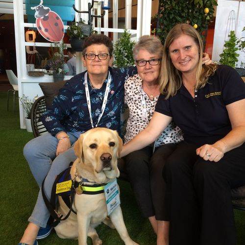 L to R: Edie (who has dementia), carer Anne, assistance dog Melvin, trainer Greer Gerson of Seeing Eye Dogs Australia. (9NEWS)