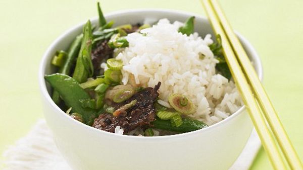 Stir fry beef with sugar snap peas and rice