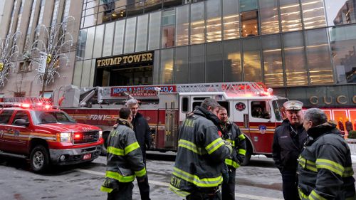 New York City Fire Deptartment vehicles sit on Fifth Avenue in front of Trump Tower, in New York. (AAP)