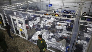 In this March 30, 2021, file photo, minors are shown inside a pod at the Donna Department of Homeland Security holding facility, the main detention center for unaccompanied children in the Rio Grande Valley run by U.S. Customs and Border Protection (CBP), in Donna, Texas.
