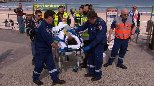 Two teenagers on school excursion in serious condition after nearly drowning at Bondi Beach