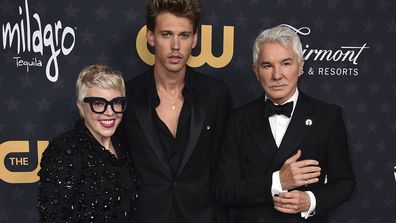 (L-R) Catherine Martin, Austin Butler and Baz Luhrmann arrive at the 28th annual Critics Choice Awards at The Fairmont Century Plaza Hotel on Sunday, Jan. 15, 2023, in Los Angeles.  