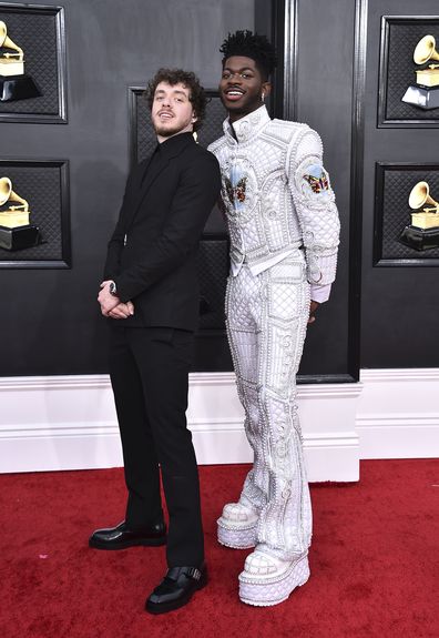 Jack Harlow, left, and Lil Nas X arrive at the 64th Annual Grammy Awards at the MGM Grand Garden Arena on Sunday, April 3, 2022, in Las Vegas.  
