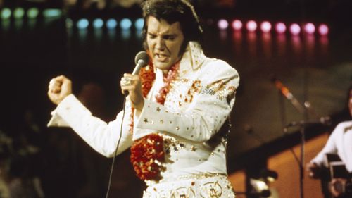 Presley performing in Hawaii in 1973. (Getty)