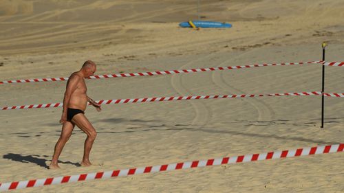 A swimmer leaves the water through the designated pathway (Joel Carrett). 