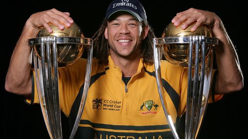 Andrew Symonds poses with the 1999 and 2003 World Cup trophies ahead of the 2007 World Cup.