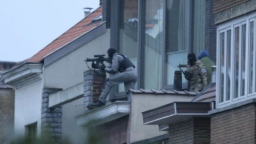A gunman has been shot following a raid in Brussels connected to the Paris terror attacks. (AAP)