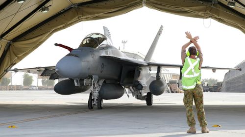 An Australian fighter jet lands in the Middle East. (AAP)