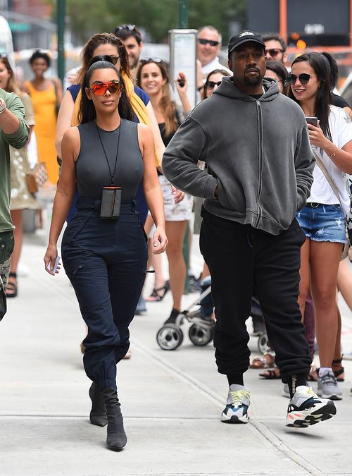 Kim Kardashian and Kanye West cause a stir on the streets of New York on Tuesday. Picture: AP