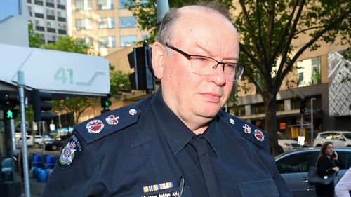 Victoria Police Chief Commissioner Graham Ashton arrives to the royal commission today.