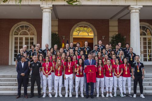 Spain's acting Prime Minister Pedro Sanchez stands with Spain's Women's World Cup soccer team after their World Cup victory, at La Moncloa Palace in Madrid, Spain, Tuesday, Aug. 22, 2023 