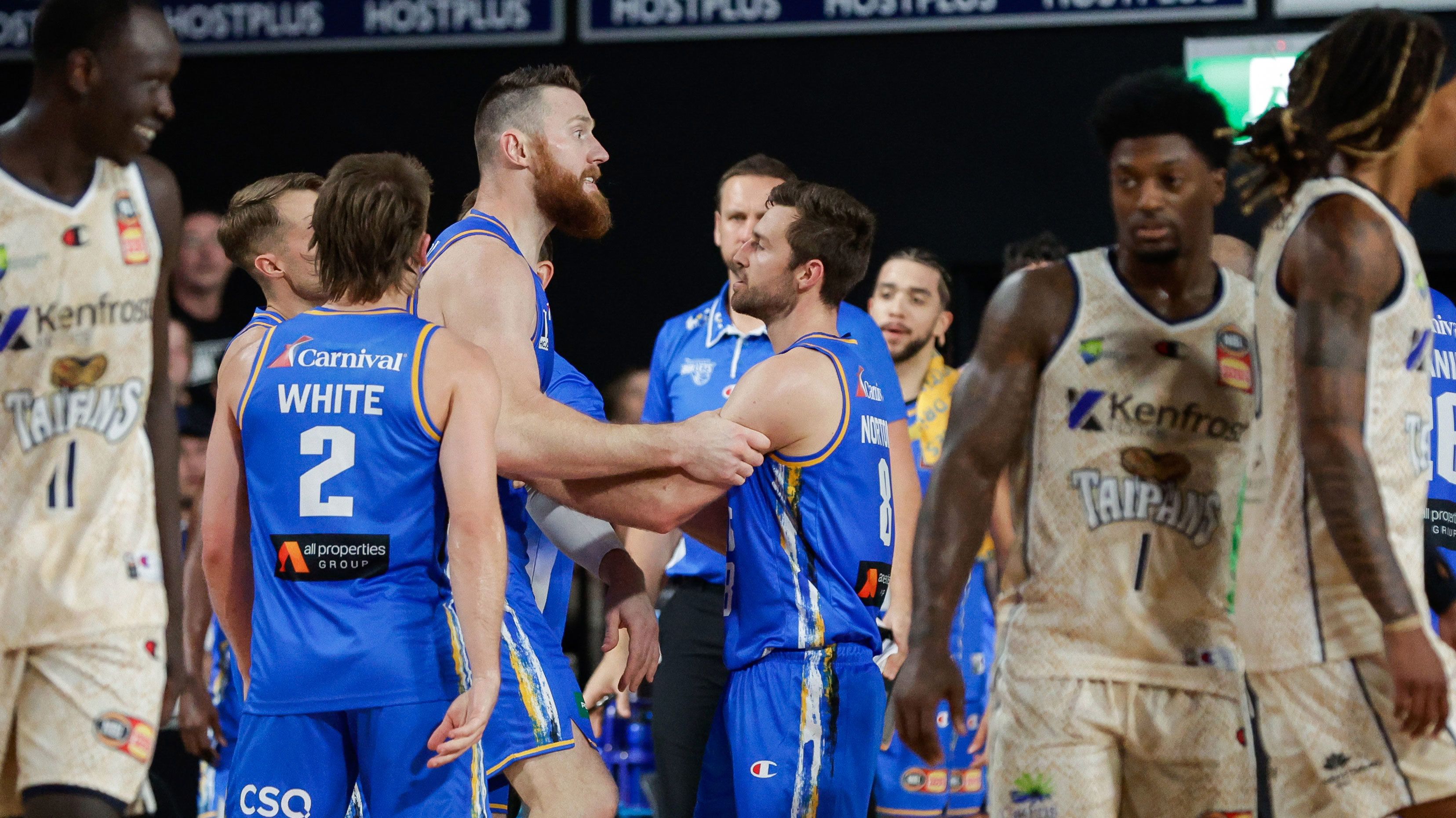 Aron Baynes of the Bullets is held back by teammates after exchanging words with officials during the round two NBL match between Brisbane Bullets and Cairns Taipans at Nissan Arena, on October 7, 2023, in Brisbane, Australia. 