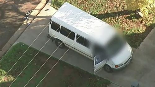 The victim was shot dead while sitting inside this Ford van. (9NEWS)
