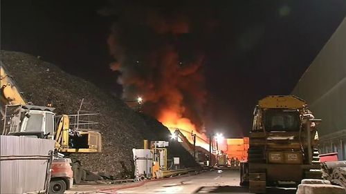 The fire tore through the factory, burning plastics and styrofoam, and releasing potentially toxic smoke into the air. Picture: 9NEWS.