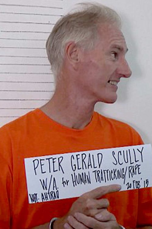 Peter Scully and his Filipino girlfriend Carme Ann Alvarez have pleaded not guilty to charges of raping and trafficking two girls aged 9 and 12 in a southern Philippine city. (AAP)
