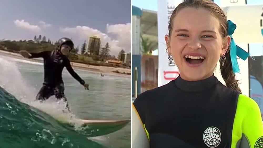 Surf prodigy, 11, pokes fun at her fat dad