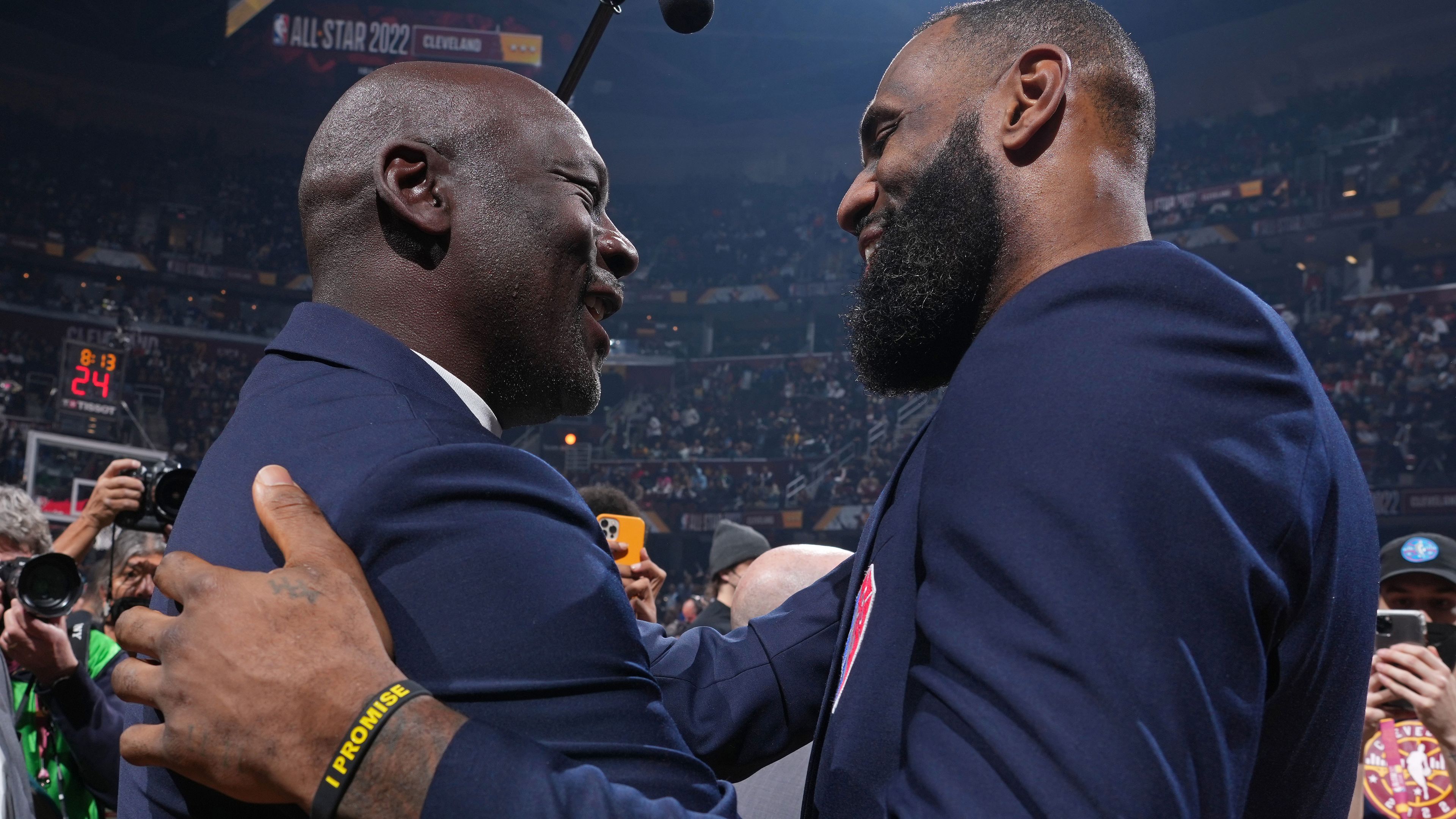 Michael Jordan and LeBron James shake hands during the 2022 NBA All-Star Game.