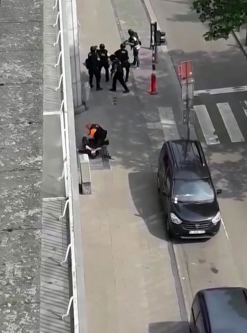 Police converge on shooter Benjamin Herman after his shooting rampage in Liege. Picture: AP