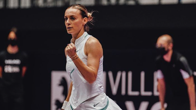 Ana Bogdan wears white during tennis match to symbolise peace