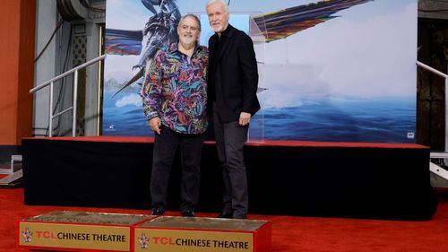 HOLLYWOOD, CALIFORNIA - JANUARY 12: (L-R) Jon Landau and James Cameron attend their Hand and Footprint Cement Ceremony At TCL Chinese Theatre on January 12, 2023 in Hollywood, California. (Photo by Kevin Winter/Getty Images)