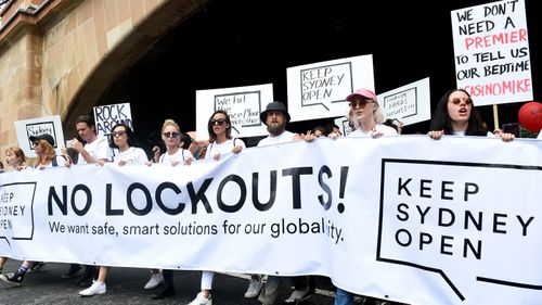 Demonstrators take part in protest rally against the NSW government's lockout laws and impact on nightlife in Sydney, Sunday, Feb. 21, 2016.