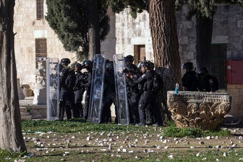 Palestinians clash with Israeli security forces at the Al Aqsa Mosque