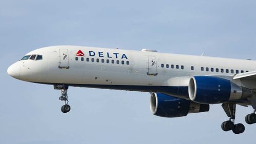 A woman passed through multiple security checkpoints at New York's JFK International Airport this week and boarded a plane to Paris, apparently hiding in the plane's bathrooms during the flight.