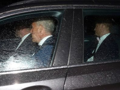 Prince Harry sits in the backseat of a car, as it arrives at Balmoral Castle.