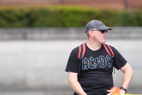 A fan outside the funeral for Malcolm Young. (AAP)