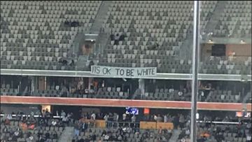 Fans outraged at 'it's OK to be white' banner at Big Bash