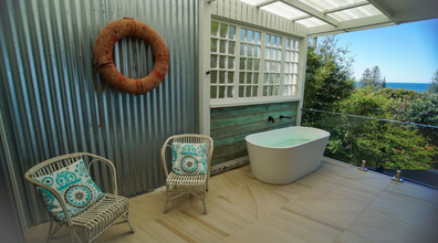 Homes on the market with bath tubs on the balconies.