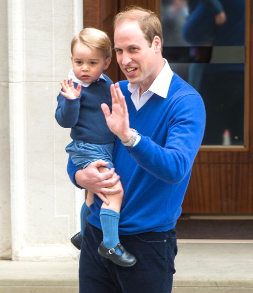 The two princes stop to wave at the crowd. (Getty Images)