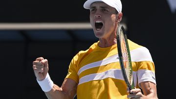 Christopher O&#x27;Connell of Australia celebrates after defeating Diego Schwartzman of Argentina in their second round match at the Australian Open.