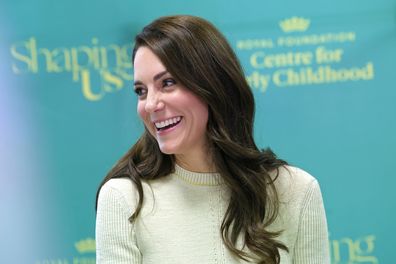 Catherine, Princess of Wales laughs with students on the Childhood Studies BA at the University of Leeds on January 31, 2023 in Leeds, England.  