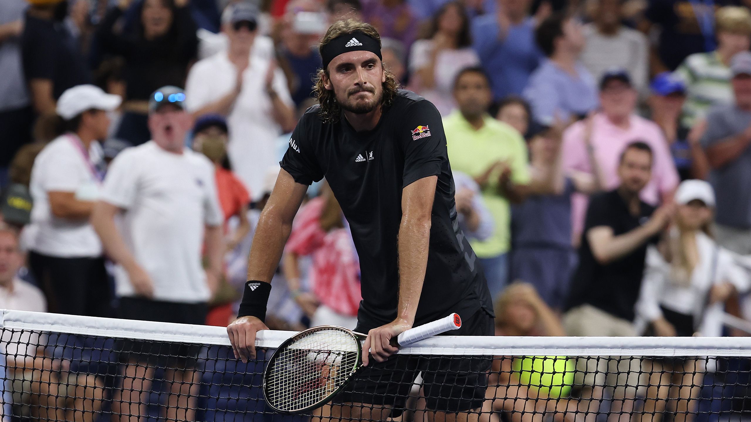 Stefanos Tsitsipas of Greece reacts after being defeated by Daniel Elahi Galan of Columbia during the Men&#x27;s Singles First Round on Day One of the 2022 US Open.