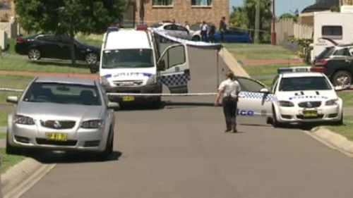 Police at the scene in Casula yesterday. (9NEWS)