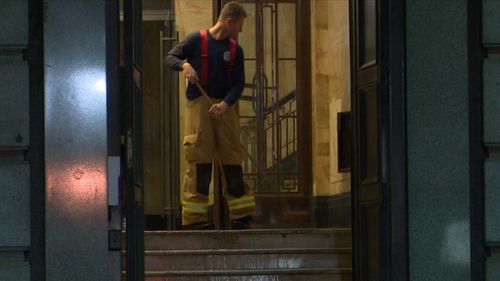 A Sydney CBD bank was flooded overnight after a fire hose was left on inside the building. Picture: 9NEWS.