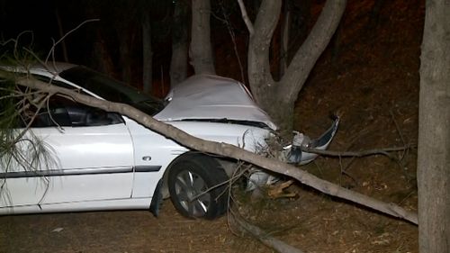 The driver of the car was taken to hospital under police guard. (9NEWS)