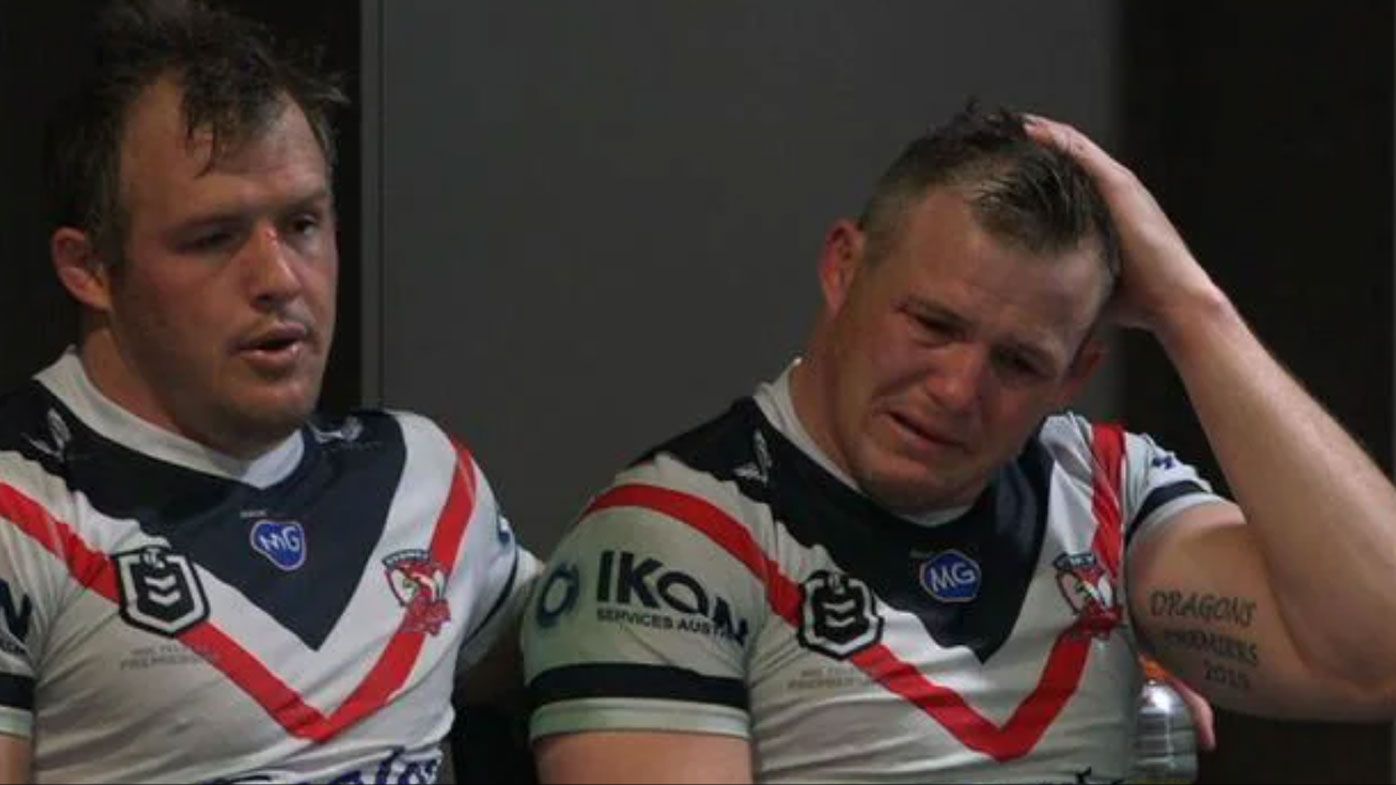 Josh Morris comforts brother Brett after a potentially career-ending injury. 